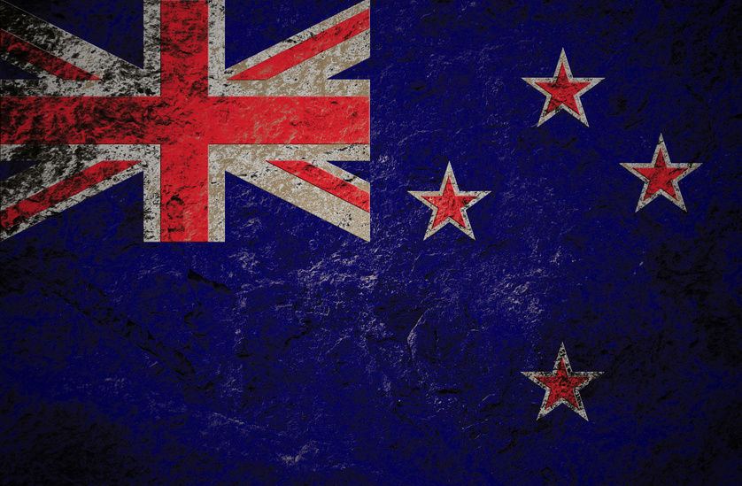 Newzealand flag on grunge stone background